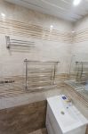 Новый полотенцесушитель, немного сместили от угла