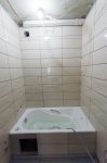 Укладка настенной плитки в ванной комнате