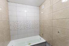 Укладка настенной плитки в ванной