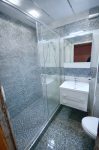 Облицовка стен керамической плиткой Aparici Bulder Grey Random